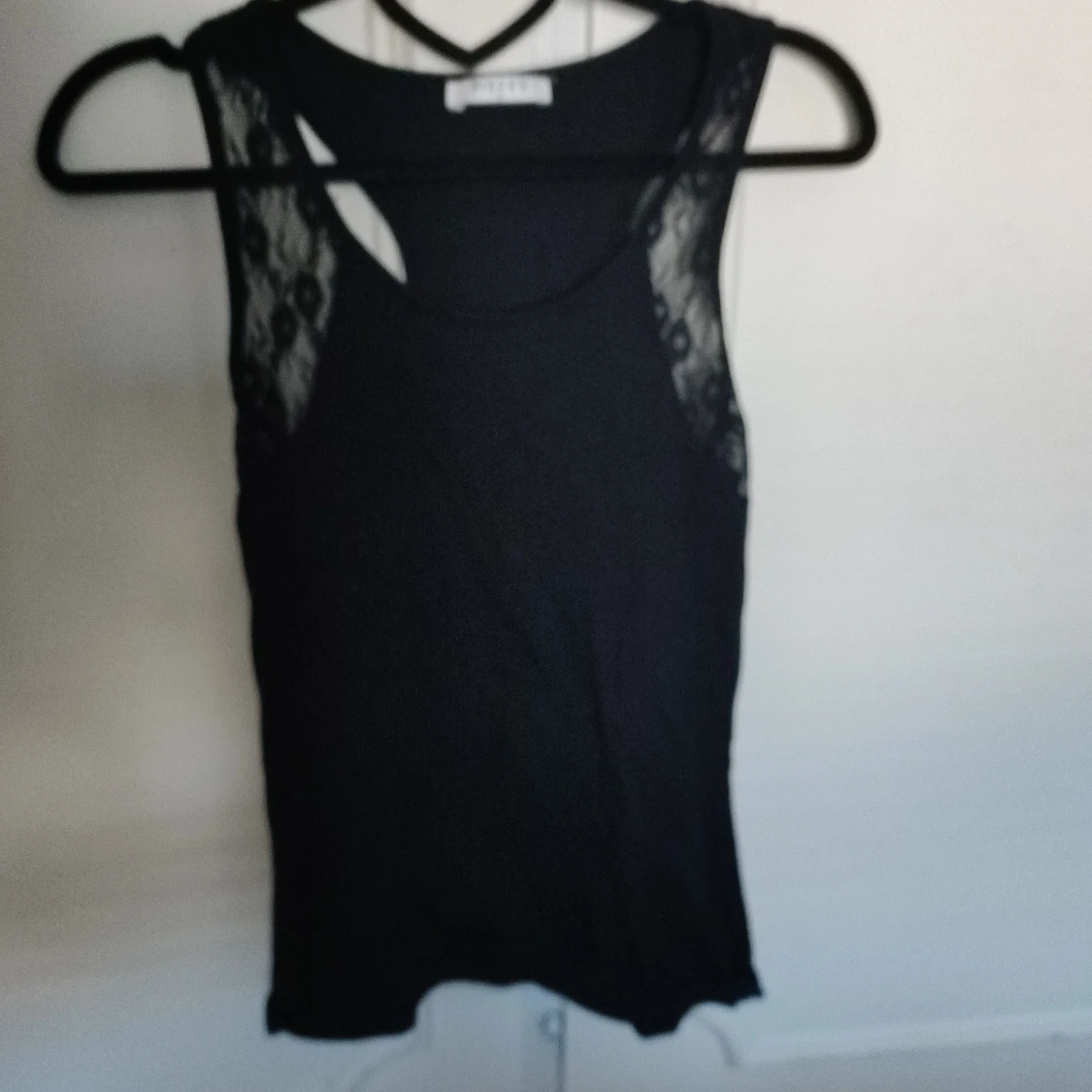 Svart linne med spets 