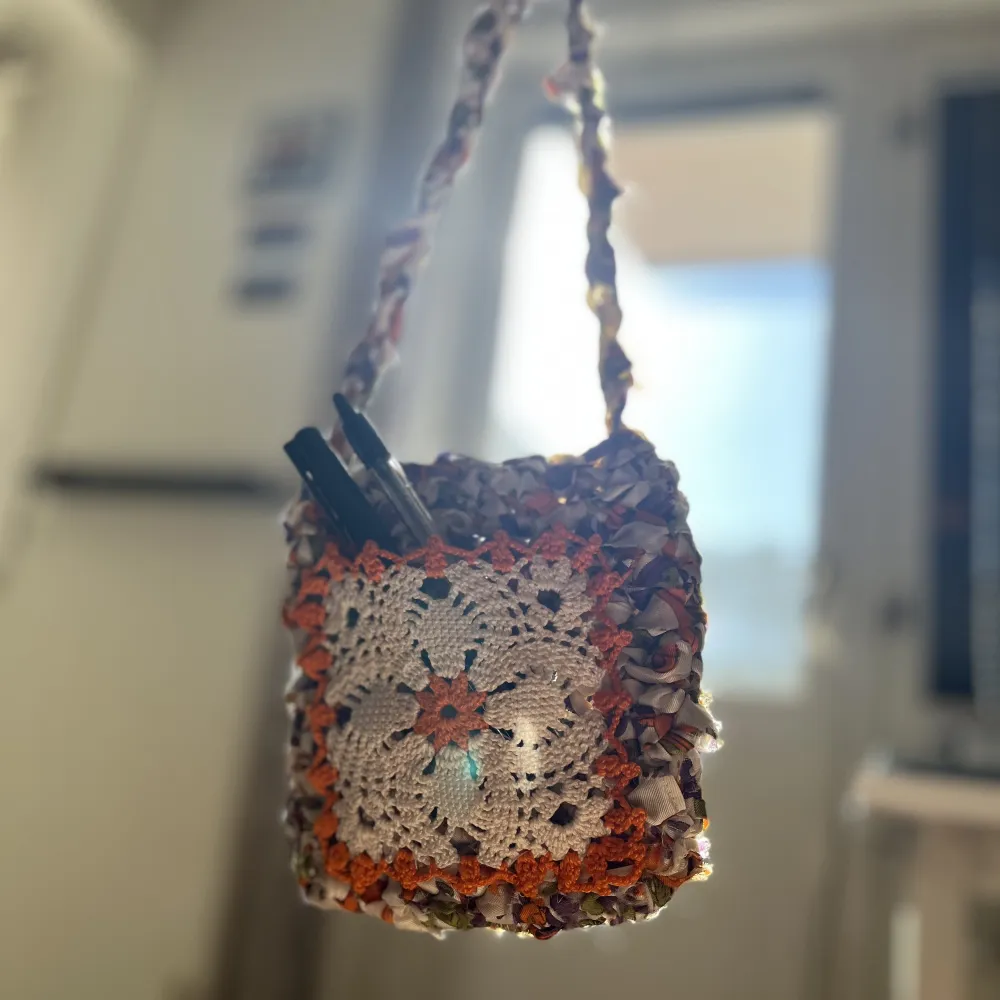 Summer crochet bag, handmade out of a smooth fabric yarn with a crochet granny square pocket on the front. perfect colors for the summer!! (note: due to the nature of the bag material, some fraying will happen) hör av dig med frågor! <3. Väskor.