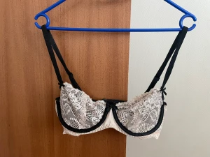 Pink and black lace bra - Pink and black lace bra. Size 70C. Good condition.