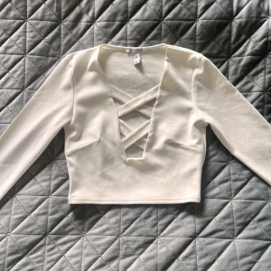 Topp ifrån Nelly  - Oanvänd topp ifrån Nelly 