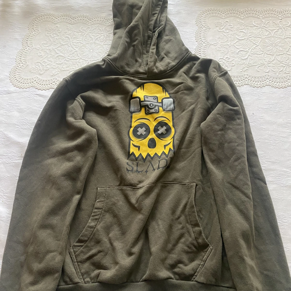 Grön hoodie