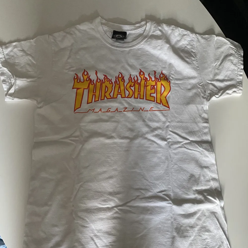 Säljer en Thrasher t-shirt, Inte använd, säljer den för den passar inte mig längre . T-shirts.