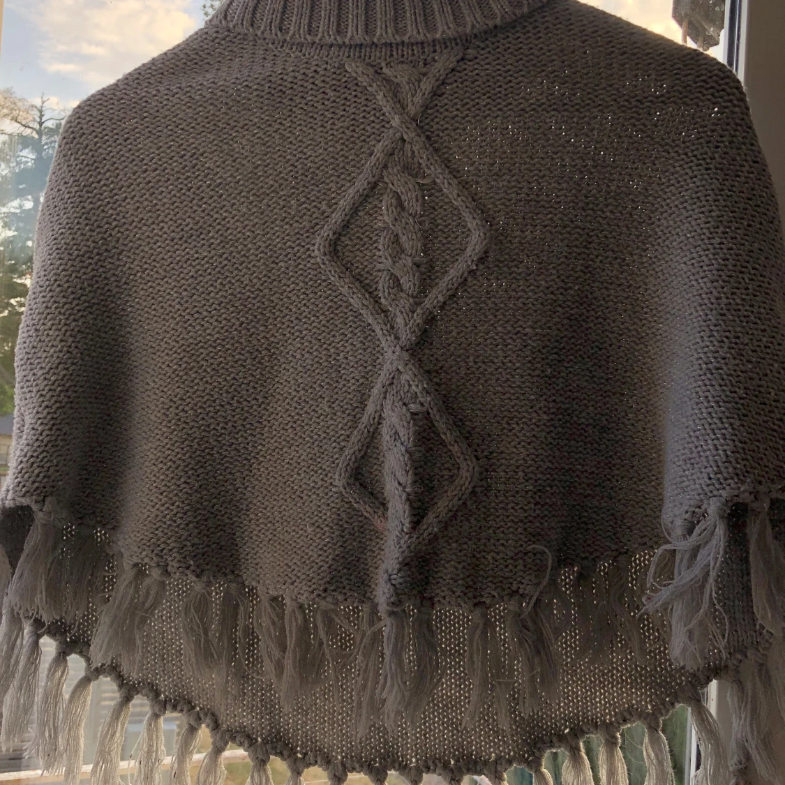 Är typ en grå Poncho  - 91