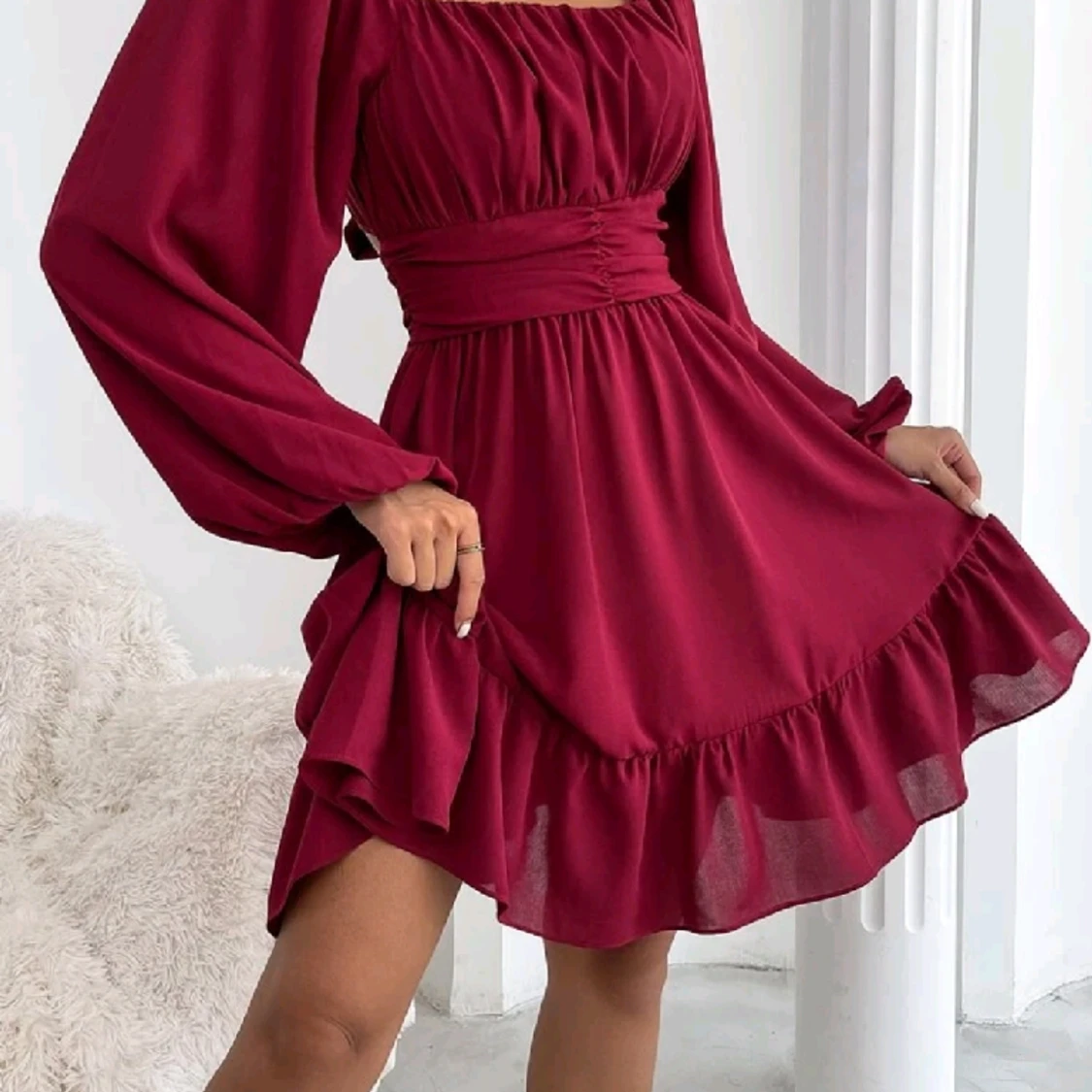 Klänning med rosett