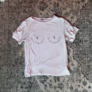 Semi see through t shirt with print, very soft material, all white back.  Good condition 