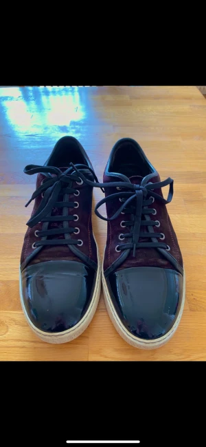 Lanvin - Lanvin sneakers Skick 8/10 Storlek 11 UK vilket motsvarar 45EU 