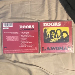 THE DOORS L.A.WOMAN - Kommer att byta plast omslaget för att det finns repor så att det kommer att se helt nytt ut.