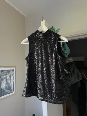 Paljettlinne - Storlek S