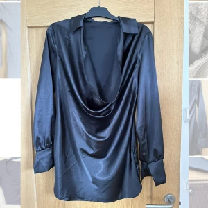 Klänning från Nelly strl XS - Storlek xs