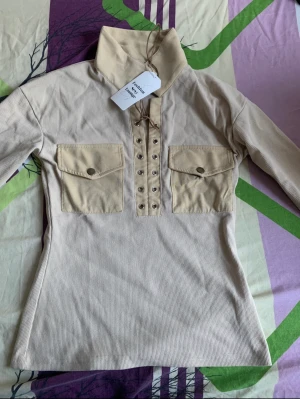 Crop Top Y2K - Rapcopter Y2K Lace Up T Shirt Knitted Skin Full Sleeve Pockets Crop Top Turn Down Collar Retro Harajuku Tee Women Autumn Korean