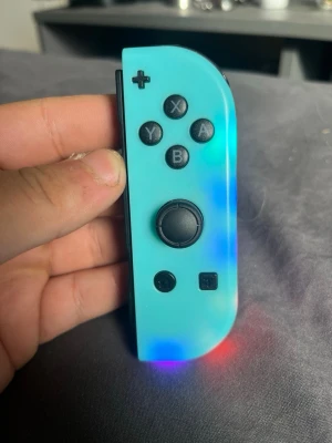 Turkos Nintendo Switch Joy-Con - Säljer ett par sådana här. Turkos,grön …. Svarta och gråa kontroller säljs i par
