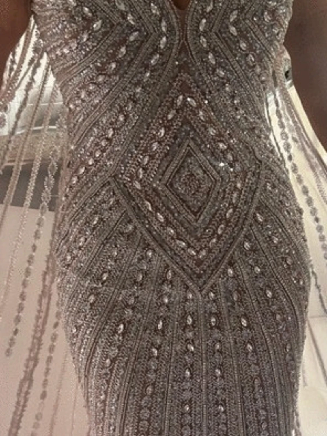 Glittrig silverklänning med pärlor