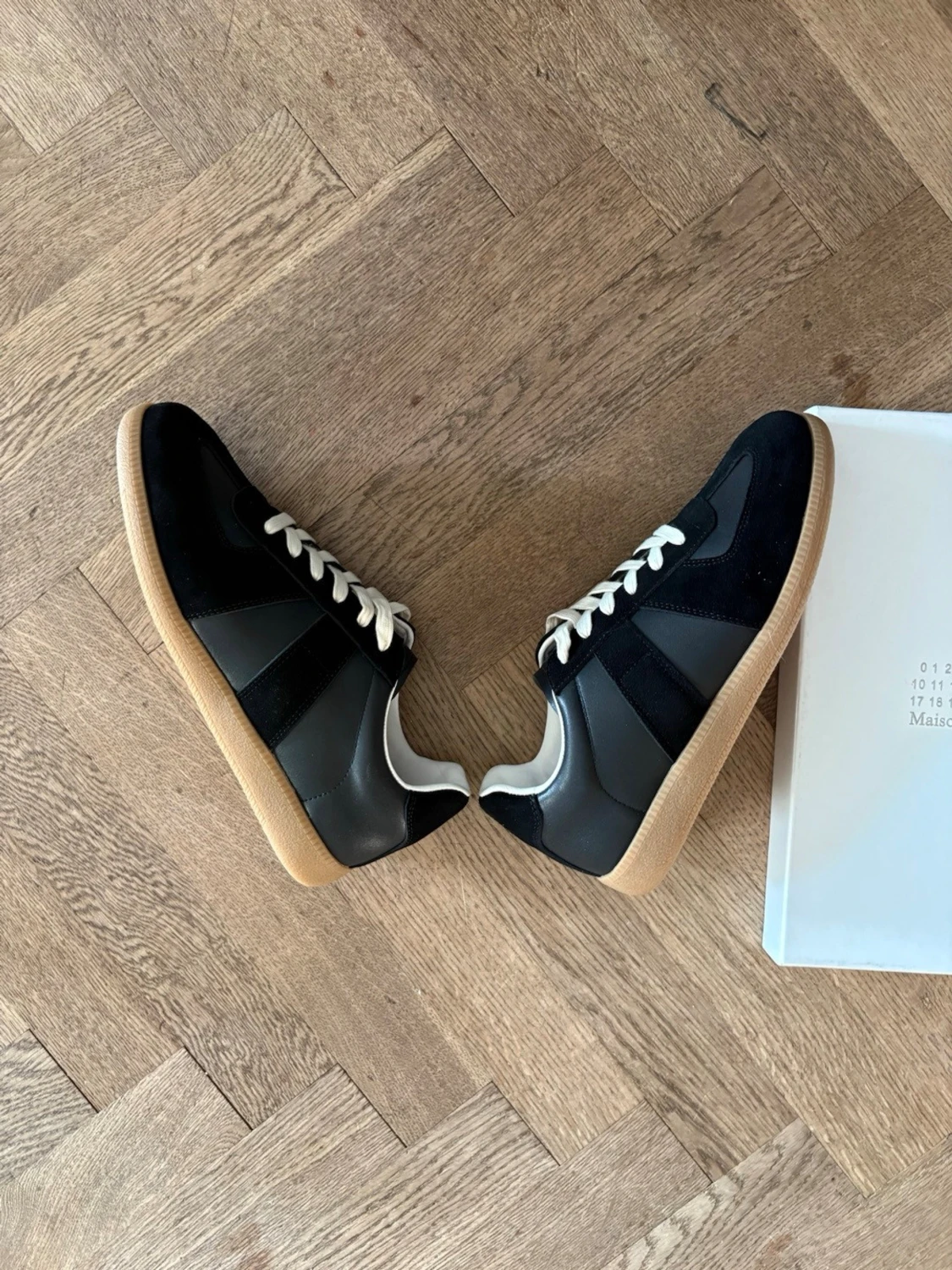 Svarta Maison Margielas  - 2