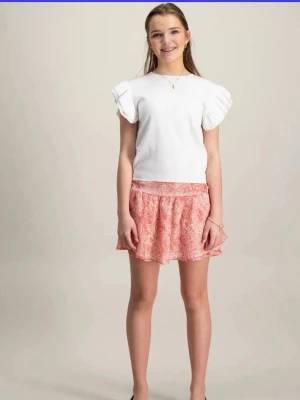 Rosa mönstrad kortkjol med volang - Söt kortkjol i rosa med vitt paisleymönster och volangkant. Kjolen har en avslappnad passform och är tillverkad i ett lätt material som passar perfekt till varma dagar. Perfekt att matcha med en enkel topp för en fräsch look.