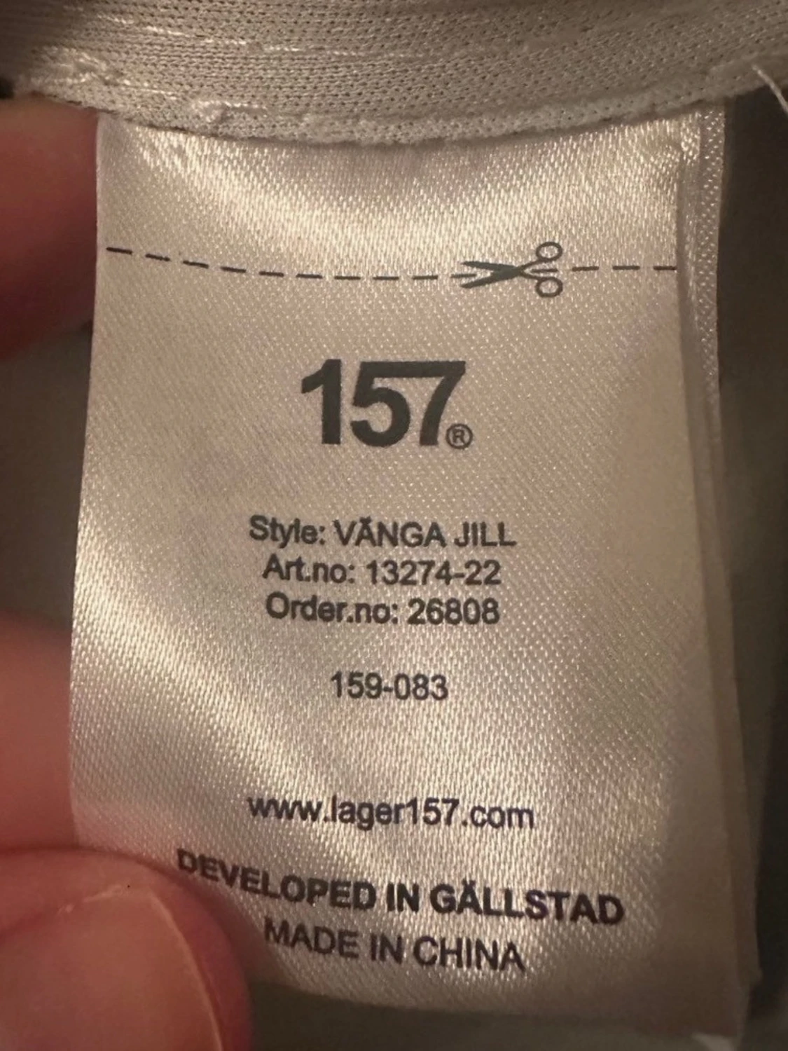 Svart regnjacka med huva - 3