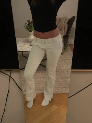 Kostymbyxor  - Vita lågmidjade kostymbyxor