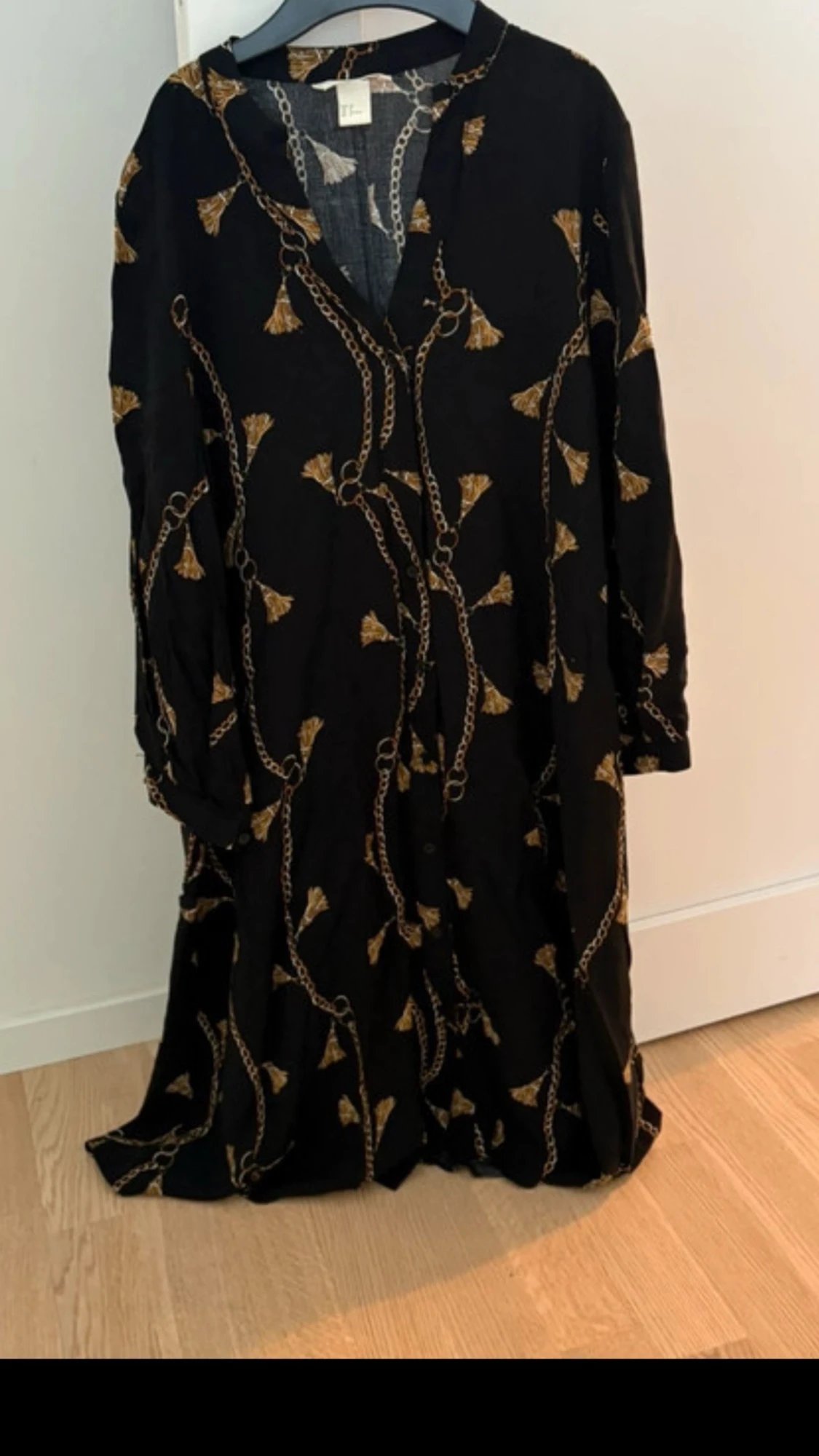 Svart mönstrad klänning från H&M