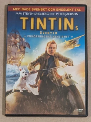 DVD  TINTINs ÄVENTYR ENHÖRNINGENS HEMLIGHET  - DVD film , TINTINs ÄVENTYR ENHÖRNINGENS HEMLIGHET . HELT OANVÄND DVD