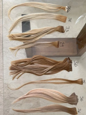 Blonda och bruna löshårsslingor - Flera olika löshårsslingor ifrån BHBD och DC, blonda och bruna nyanser. Slingorna varierar i längd. Perfekta för att skapa fylligare eller längre hår. Fästes med tejp. Säljs styckvis eller i set. 