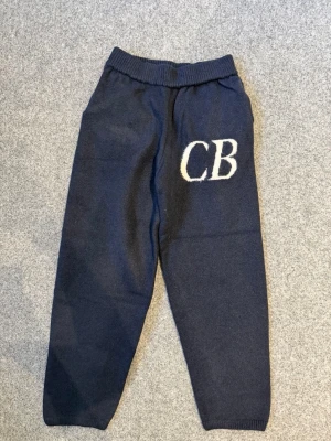 CB Cole Buxton navy blue baggy pants - Size M. True to size, and in very good condition just like new!! It becomes baggy when you wear shoes, it goes on top of the shoe perfectly