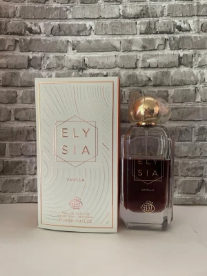 Elysia Vanilla fragrance world  - Elysia Vanilla Eau de Parfum från fragrance world. 100ml flaska se bilder för mängd kvar och noter . Allltid förvarad mörkt och svalt. 