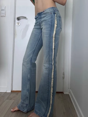 Weekday Nova low rise bootcut frayed jeans - Nova jeans from Weekday Low rise slim bootcut model with fringes Size 24 Not worn many times so they are in super good condition   You are welcome to bid :) 