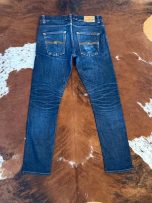 Slim nudie LeanDean DryJapanSelvage - Tjena! Säljer dessa riktigt feta Nudies i modellen LeanDean DryJapanSelvage, W32/L32, hör av dig vid funderingar!🙌