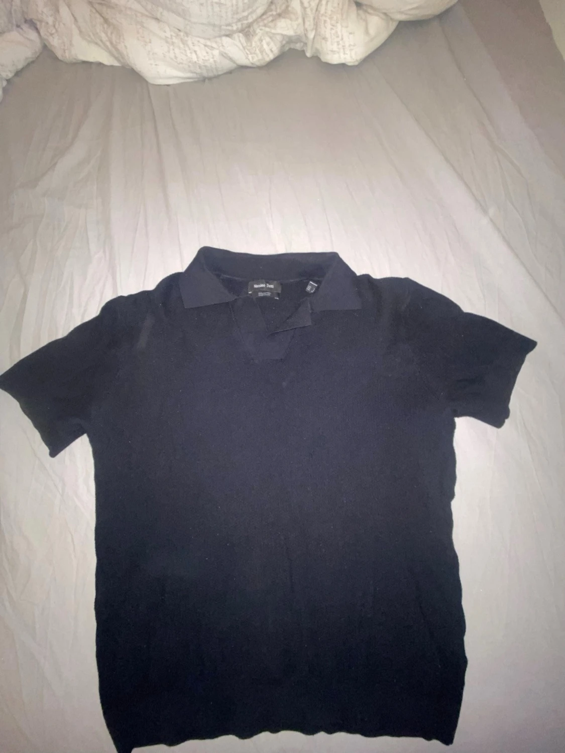 Mörkblå stickad pikétröja 