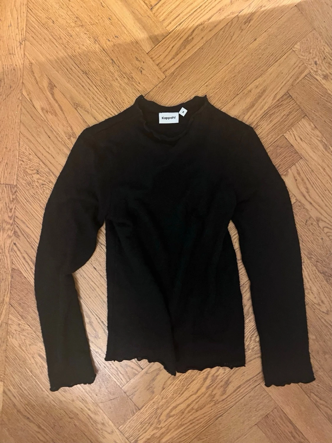 Svart polotopp från Kappahl