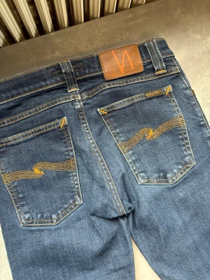 Nudie slim fit jeans grisch - Se bild för relevanta mått 