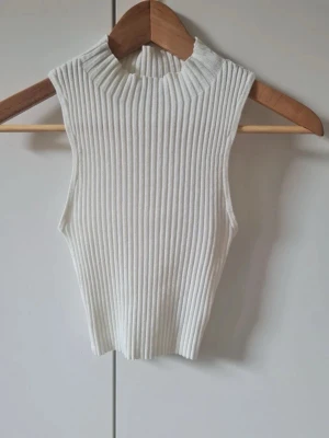 Dam topp, str XXS - Ärmlös topp från H&M