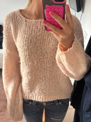 Cubus Apricot Knit Sweater - Beautiful apricot knitted sweater from Cubus with a soft and cozy feel. A feminine and trendy piece with a lovely warm color that is perfect for creating an effortless and stylish outfit. Easy to style for everyday wear, autumn, and layering.  * Cubus * Size 170 * Beautiful apricot color * Soft knitted material * Cozy and comfortable fit * Trendy and timeless * Easy to dress up or down