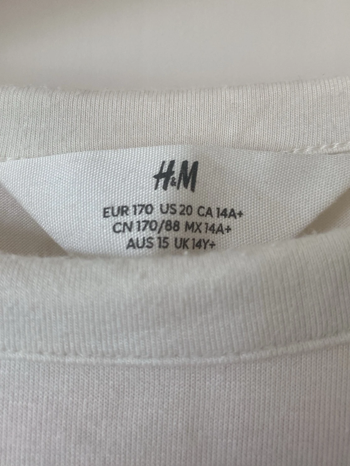 Vit topp från H&M med trekvartsärm - 1