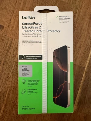 Belkin ScreenForce UltraGlass 2 skärmskydd för iPhone 16 Pro - Helt nytt och oöppnat Belkin ScreenForce UltraGlass 2 skärmskydd. För iPhone 16 Pro. Originalförpackning.