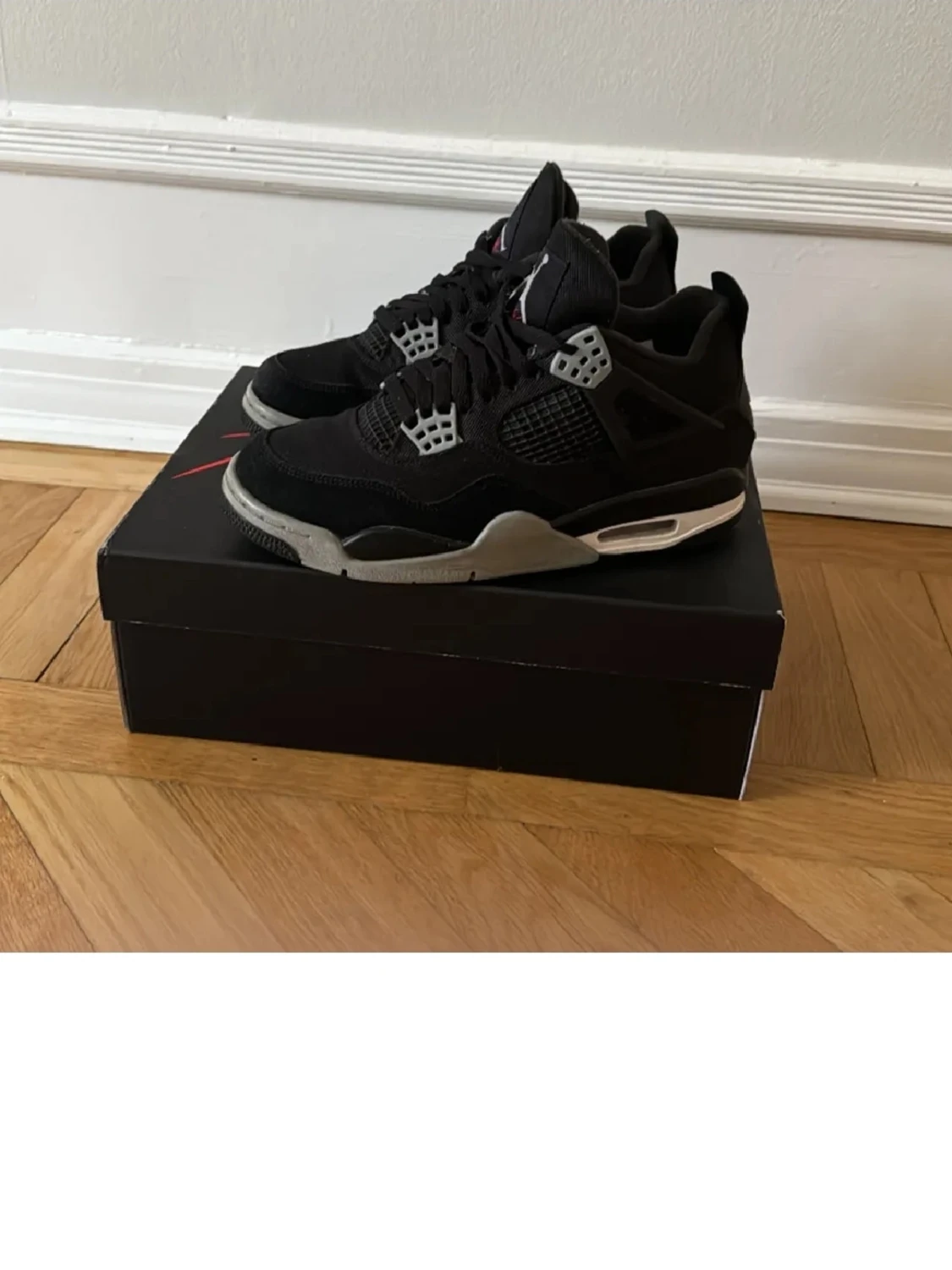 Svarta Air Jordan 4 Retro sneakers - 1