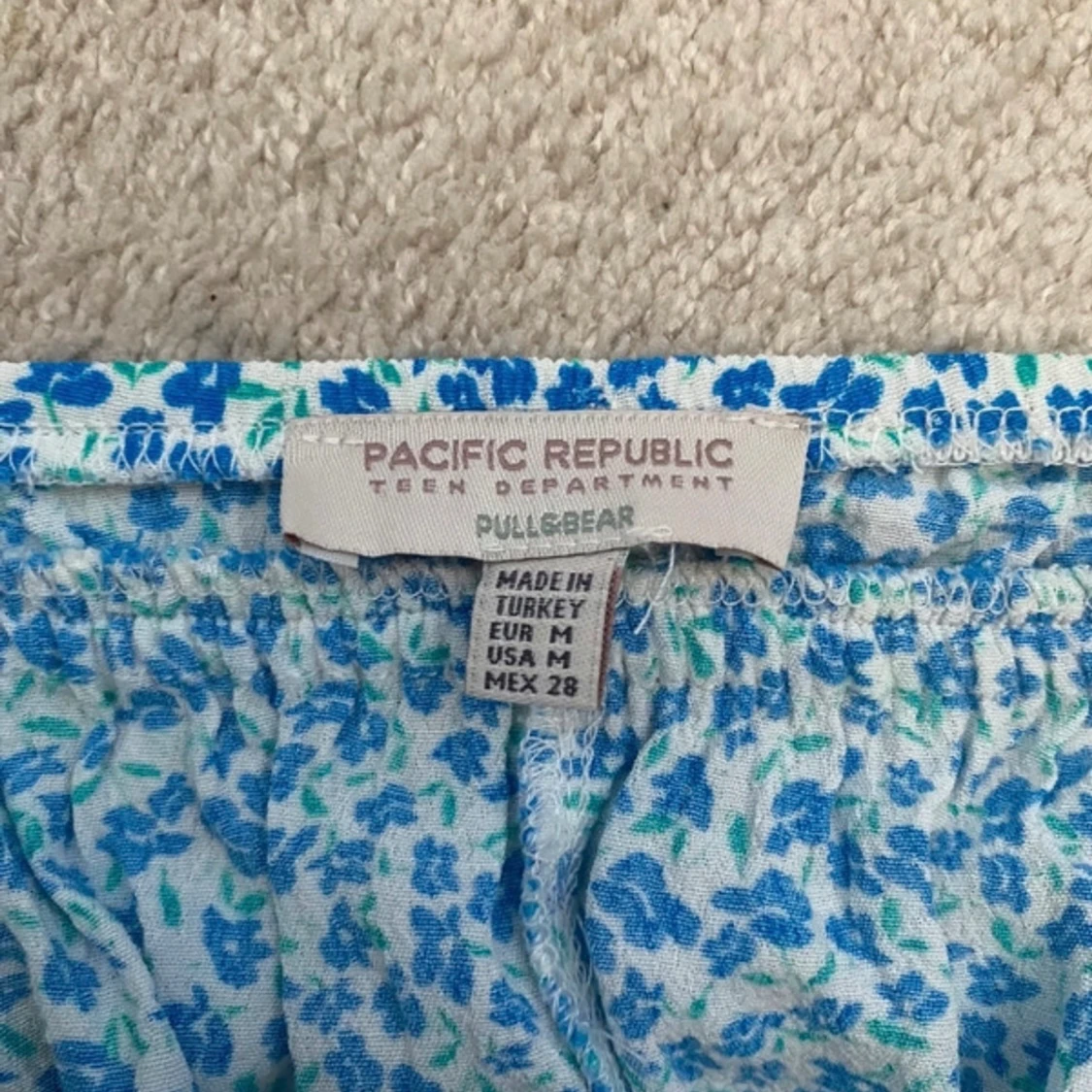 Blommig blå kortklänning - 2