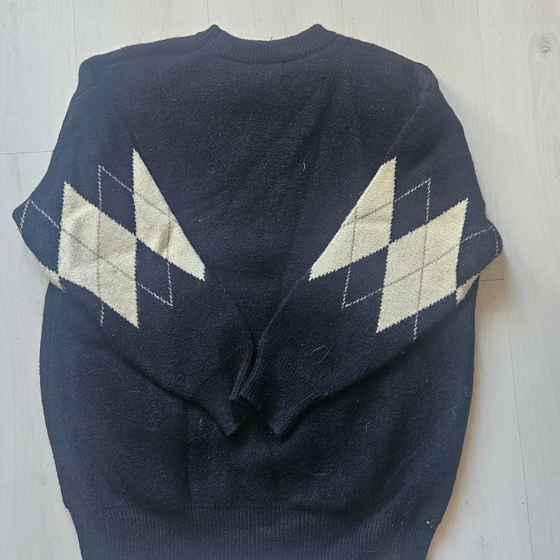 Svart stickad tröja med argylemönster - 1