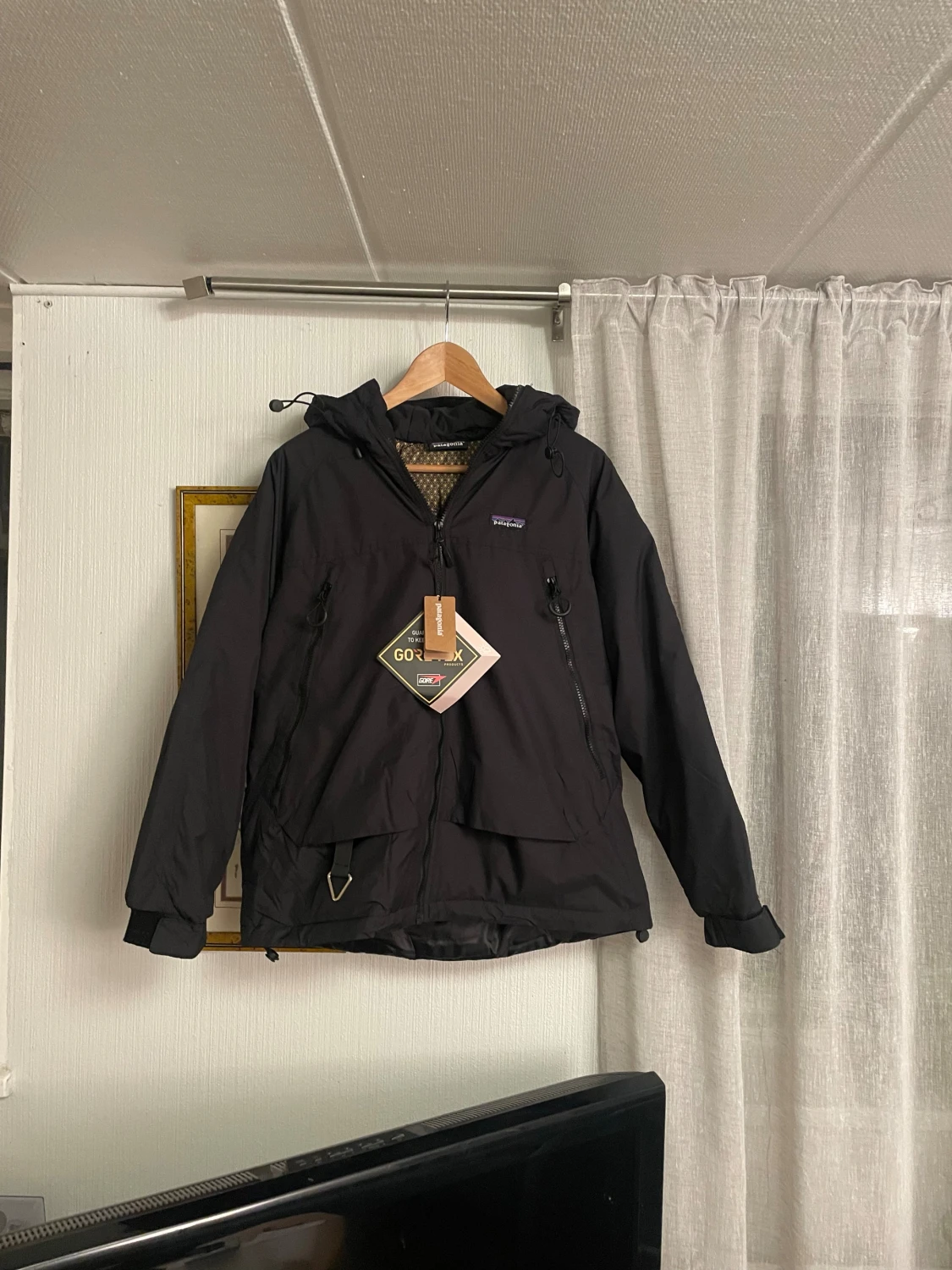 Svart Patagonia vinterjacka med huva!