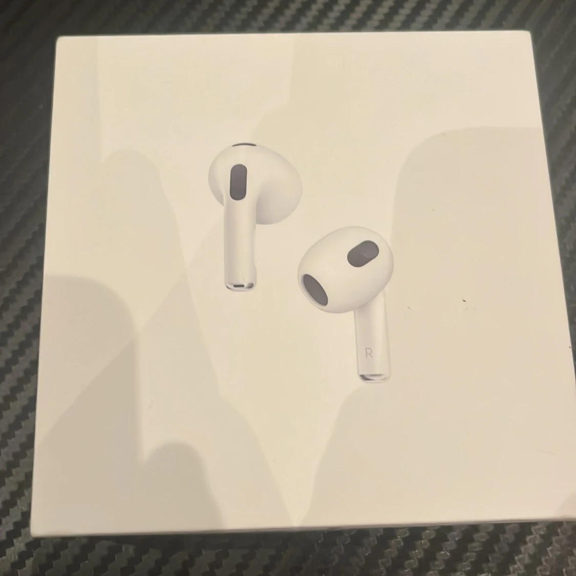 Apple AirPods (3rd generation) med MagSafe-laddningsetui