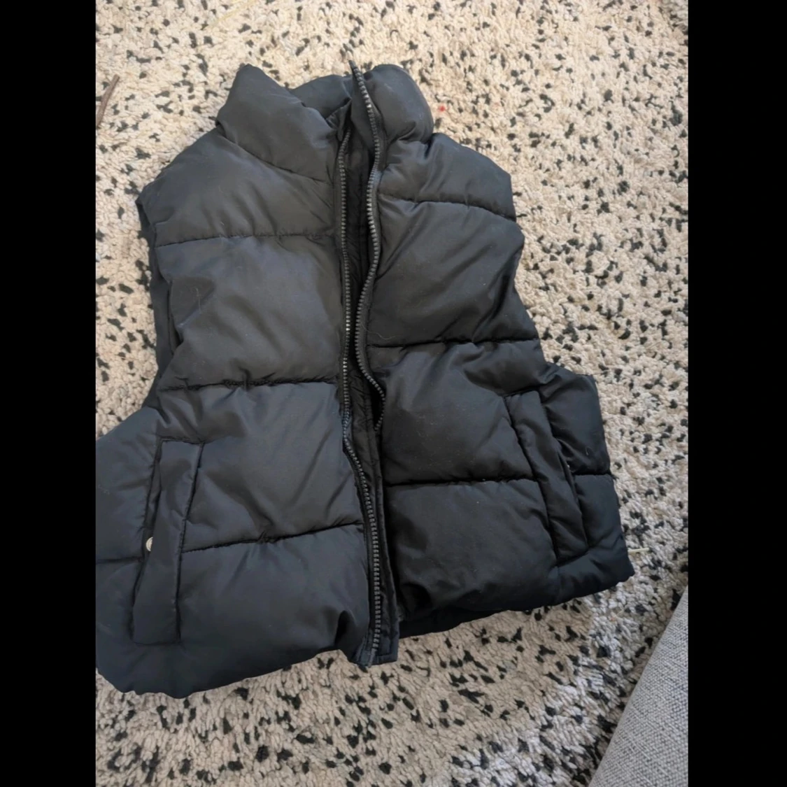 Svart dunväst med dragkedja stl xs/s