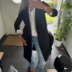 Svart kappa  - Storlek xs 