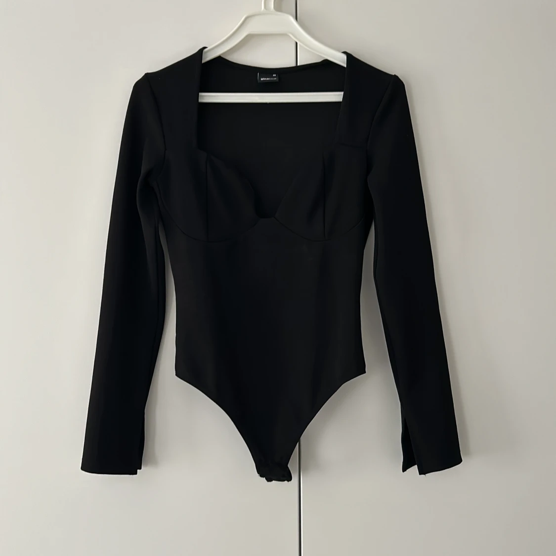 Svart långärmad bodysuit Gina Tricot XS