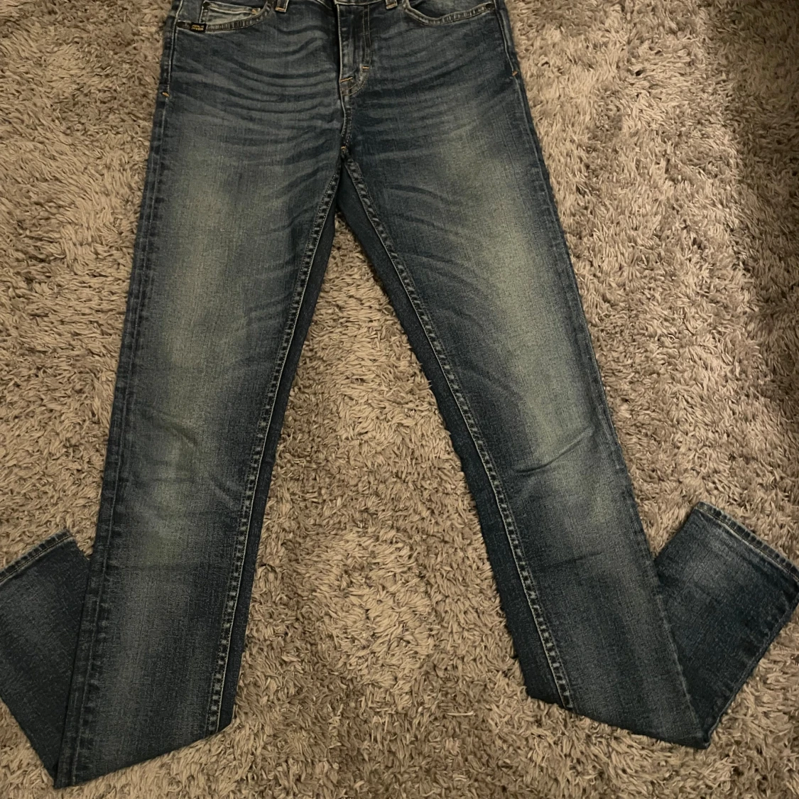 Blå jeans från Tiger of Sweden