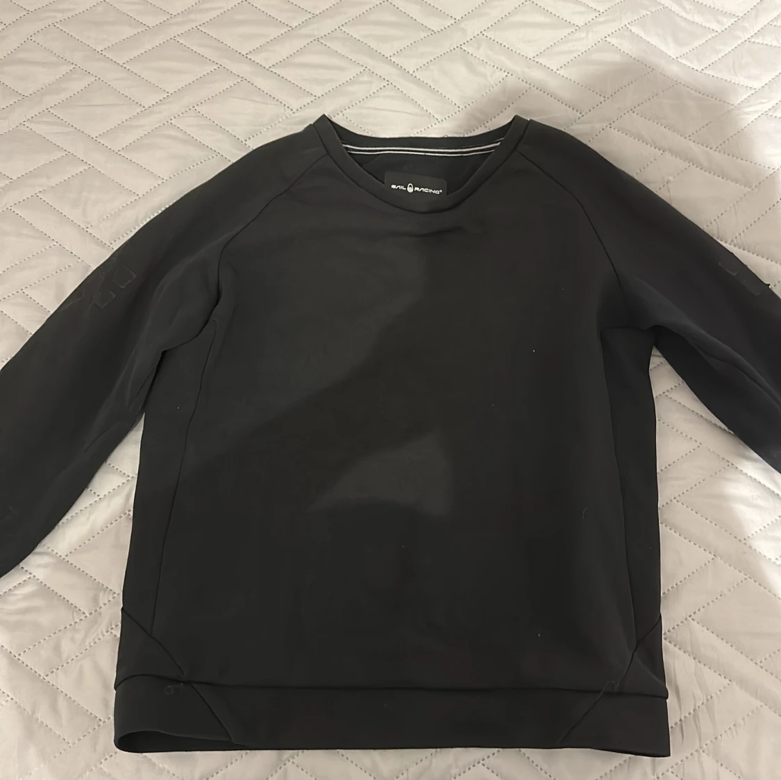 Svart sweatshirt från Sail Racing