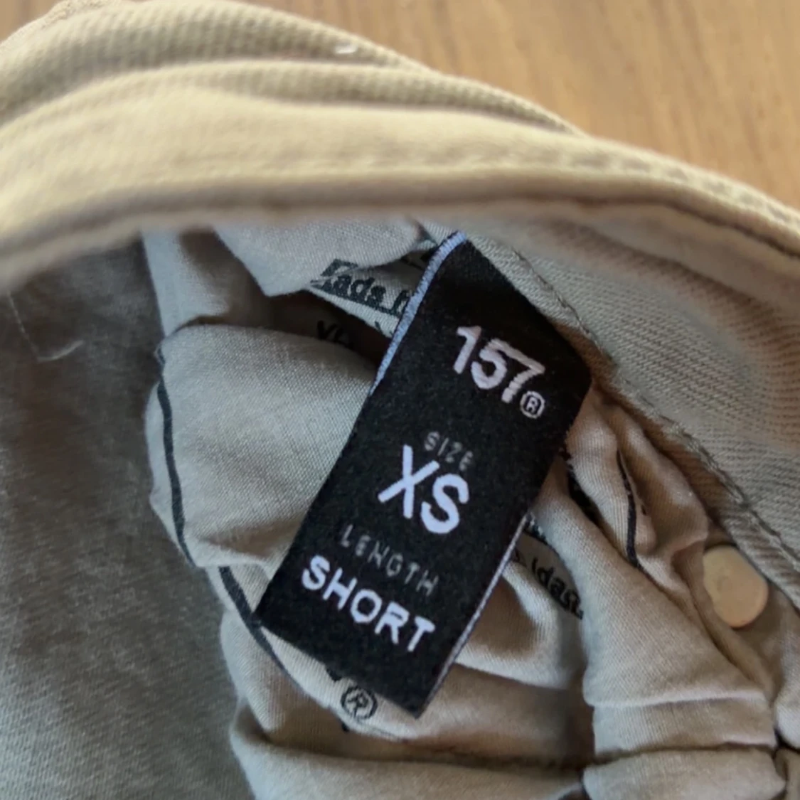 Beige bootcut-byxor från 157 XS - 2