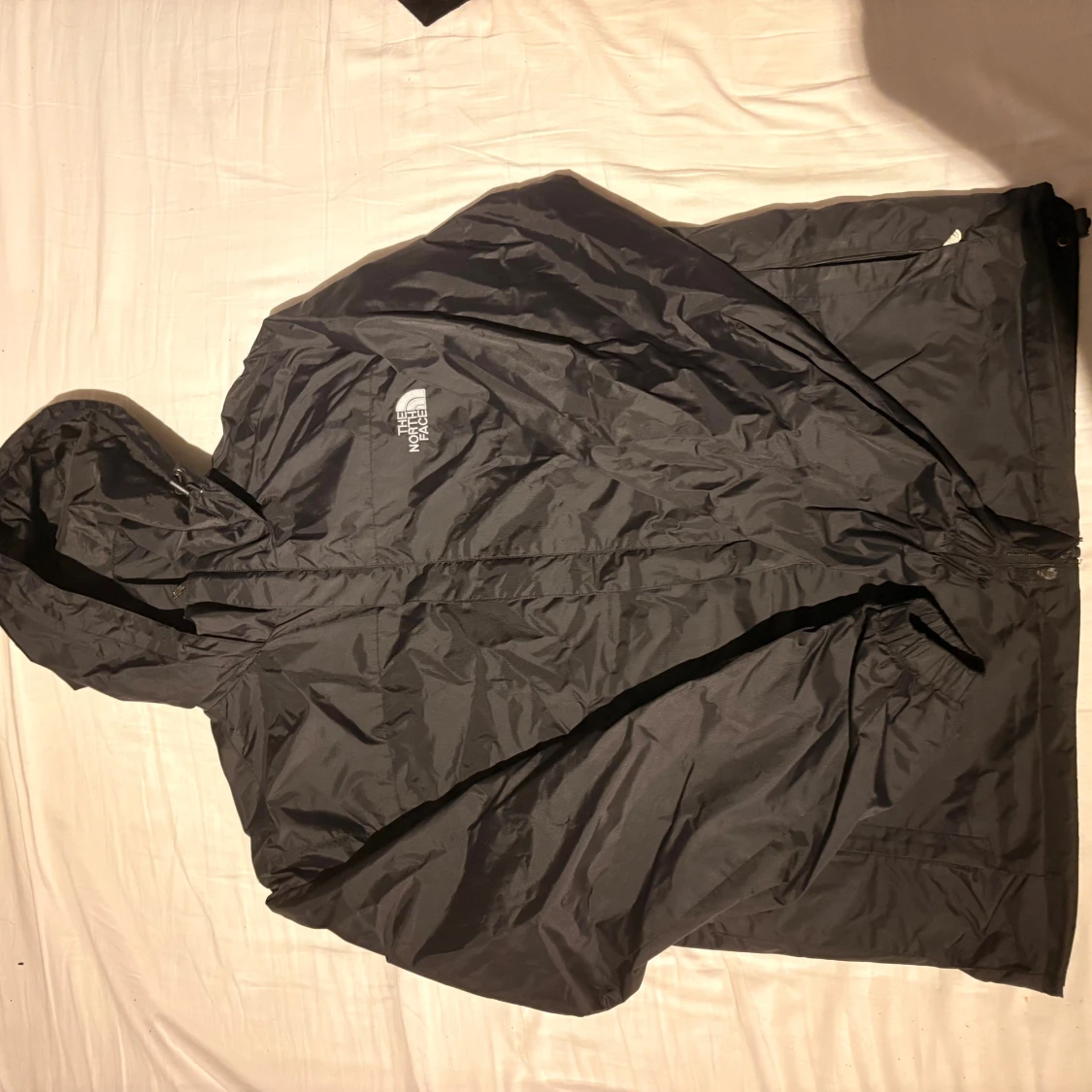 Svart vindjacka från The North Face