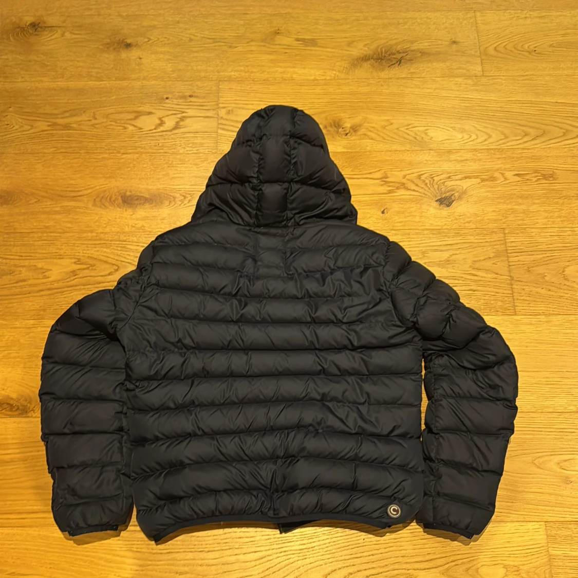 Mörkblå Colmar pufferjacka med huva - 1