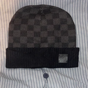 L mössa svart - Helt ny 