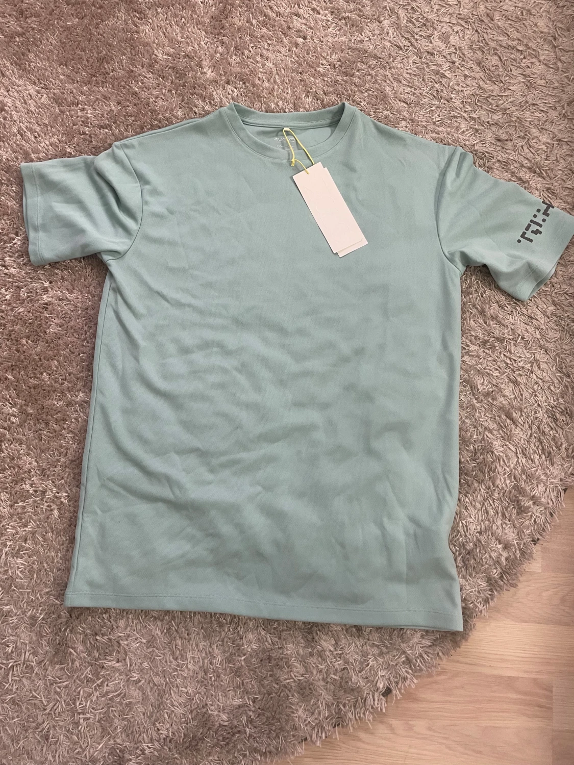 Ljusblå tränings t-shirt från H&M Move