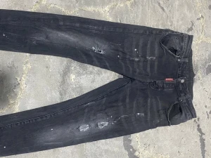 Svarta Dsquared2 slim jeans, stl 48 - Pris kan diskuteras